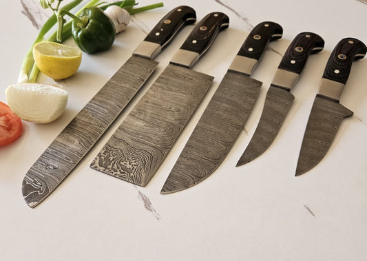 5-piece chef knife set with sleek black pakkawood handles, featuring high-quality blades designed for precision cutting. Includes essential kitchen knives with ergonomic handles for comfort and style, ideal for both professional chefs and home cooking enthusiasts.